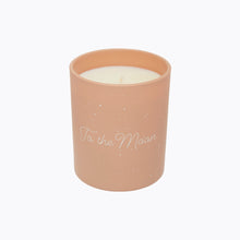 Load image into Gallery viewer, Perfect special gift, present. Our scented candle diffuses warm notes of crisp apple, muesli and almond milk, creating a soft and tender atmosphere in your home.  To help guide you towards greater inner peace and harmony, we have placed a natural gemstone pendant inside each candle. Selected with the collaboration of a lithotherapist, the stone will impart its healing properties.