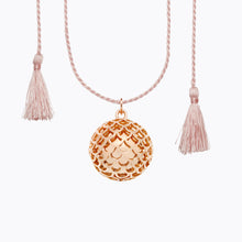 Load image into Gallery viewer, Maternity necklace / pregnancy necklace / harmony ball / bola  Composition : pendant in 18 carat gold-tone brass, silver or 18 carat  rose gold-tone brass, cord and tassels in fair trade silk Measurements : pendant diameter: 20mm, cord length: 1100 mm