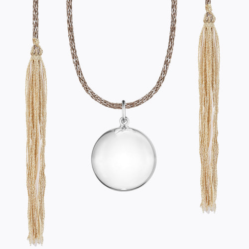 Maternity necklace / pregnancy necklace / harmony ball / bola  Composition : pendant in silver  brass  Cord in Lurex and tassels in silk Measurements : pendant diameter: 20mm, cord length: 1300 mm